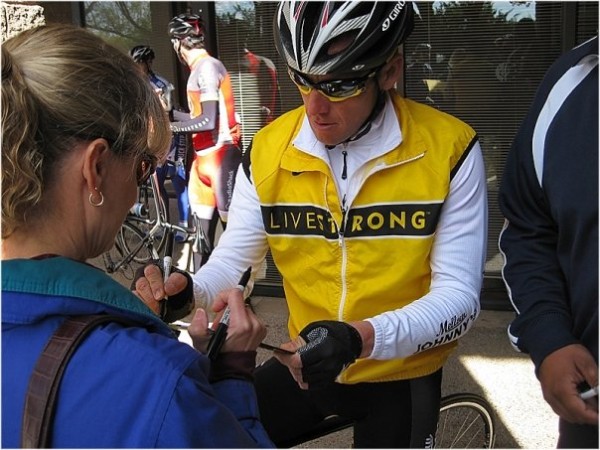 Lance Armstrong signs autographs during a team Radioshack training camp held in Tucson in December of 2009. 
